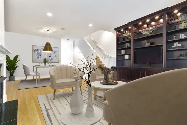 a lobby with furniture and wooden floor