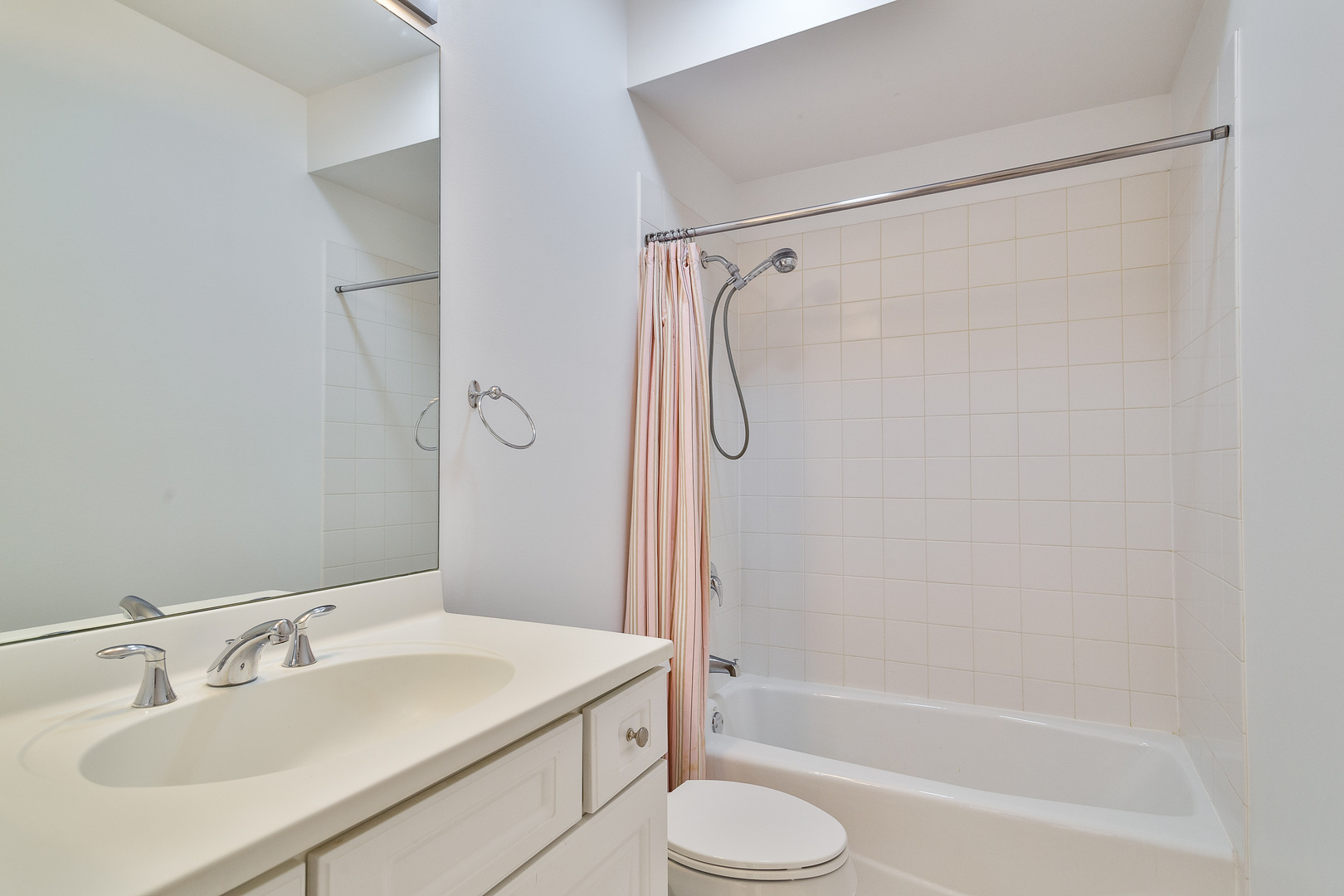 849 West Ohio Street, Unit 8 Chicago, IL 60642 - Photo 9 of 20 a bathroom with a granite countertop sink toilet and shower