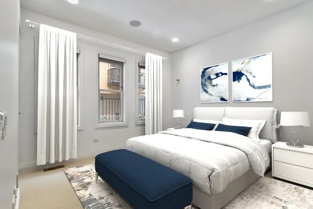 a bedroom with bed and wall painting