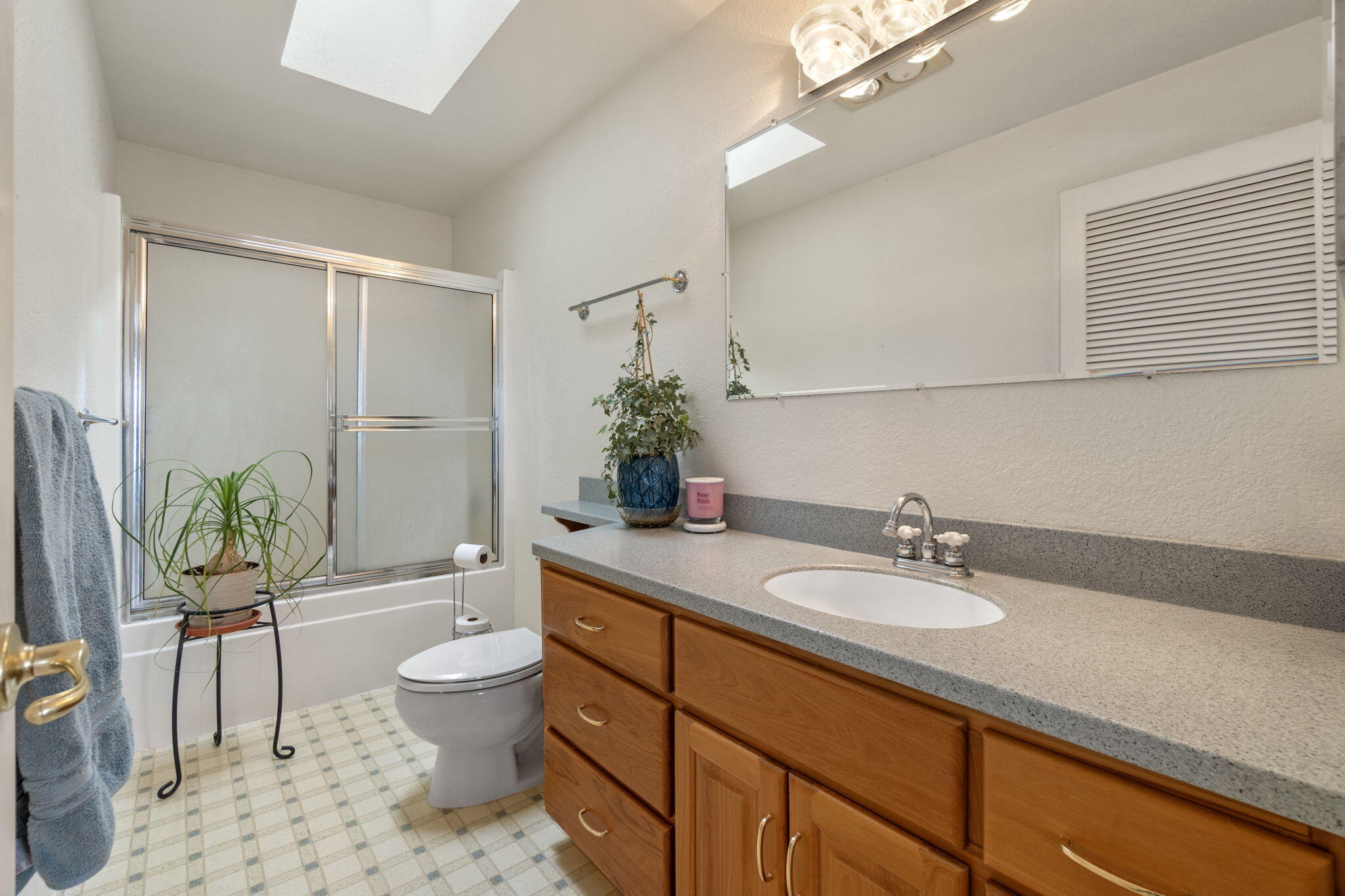 17722 Pope Road Merrill, OR 97633 - Photo 36 of 61 a bathroom with a granite countertop sink a toilet a mirror and shower