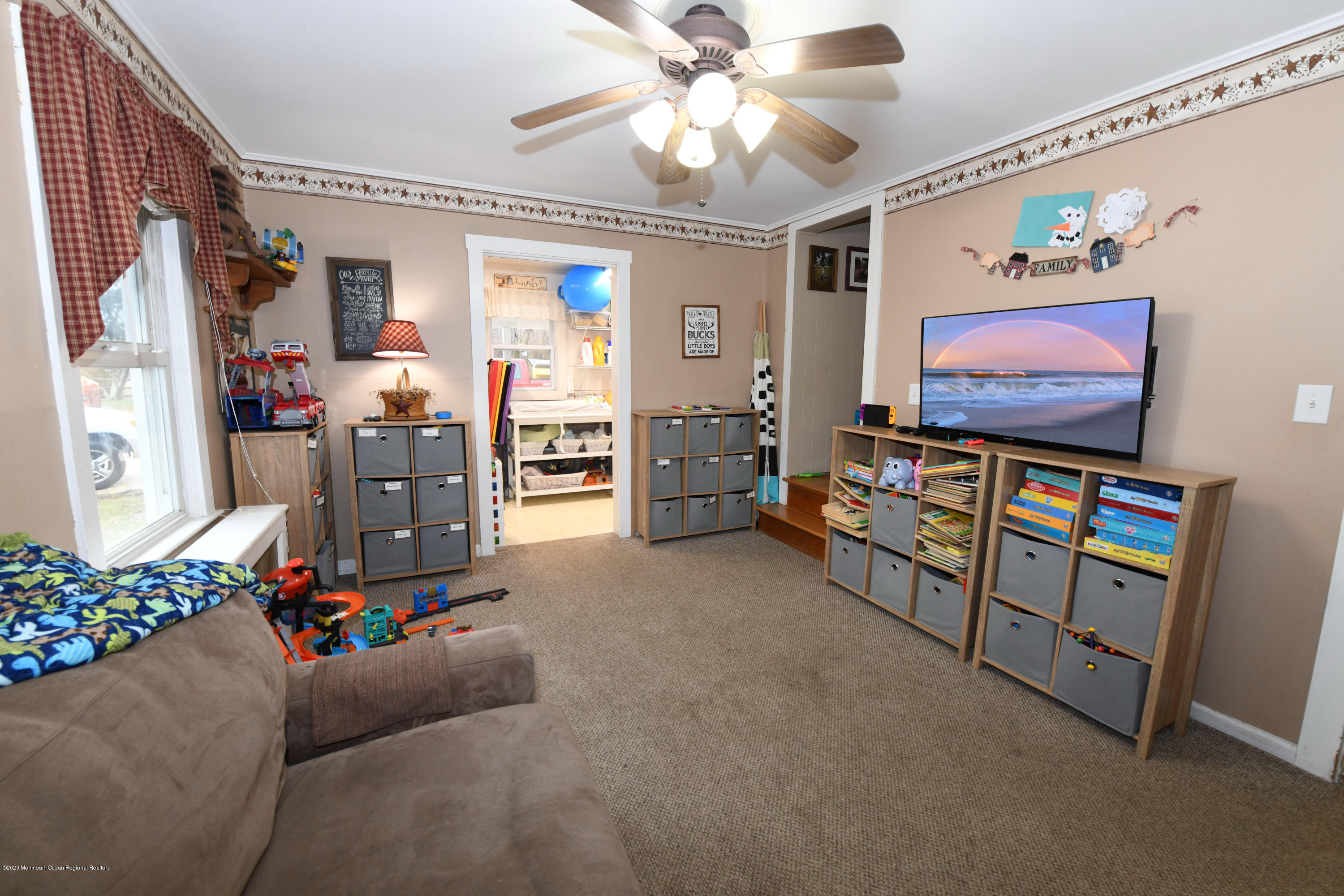 1871 Lanes Mill Road Brick, NJ 08724 - Photo 12 of 31 a living room with furniture and a flat screen tv