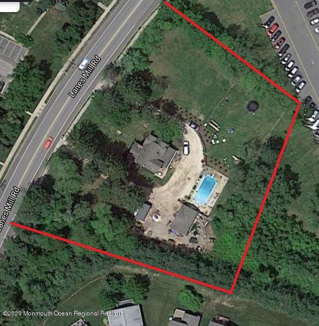 1871 Lanes Mill Road Brick, NJ 08724 - Photo 3 of 31 an aerial view of a yard