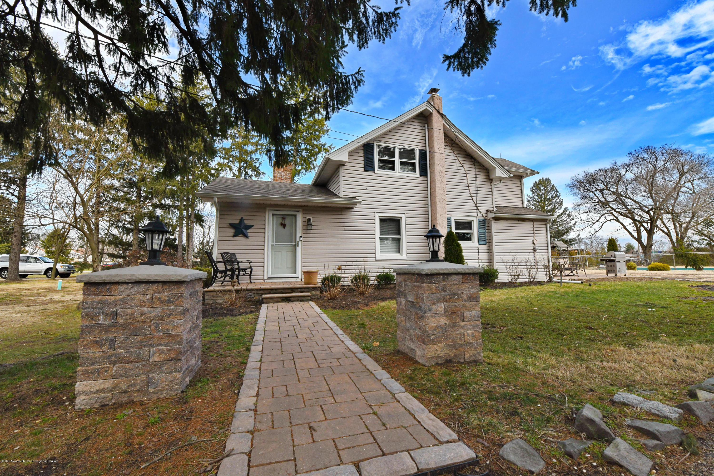 1871 Lanes Mill Road Brick, NJ 08724 - Photo 25 of 31 a front view of a house with garden