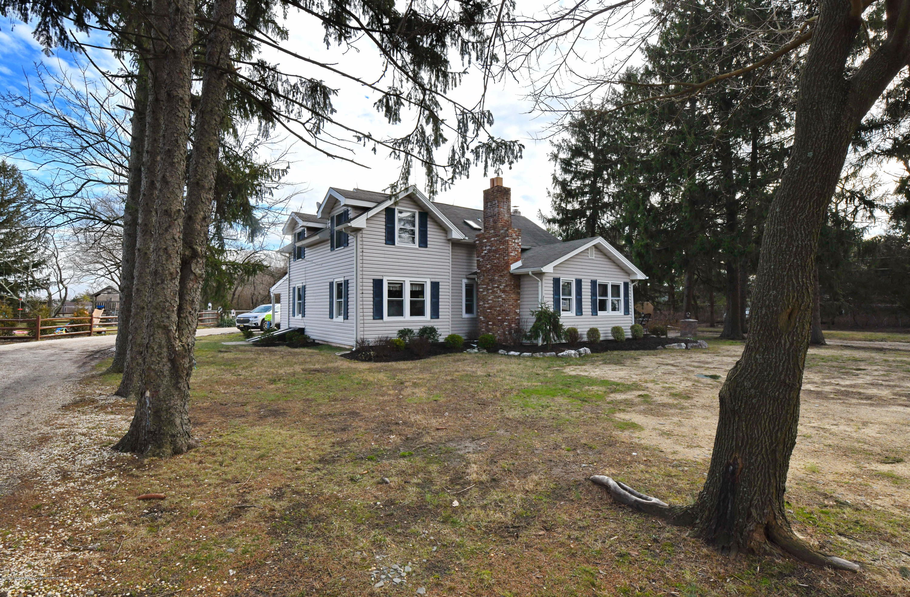 1871 Lanes Mill Road Brick, NJ 08724 - Photo 27 of 31 a front view of a house with a yard