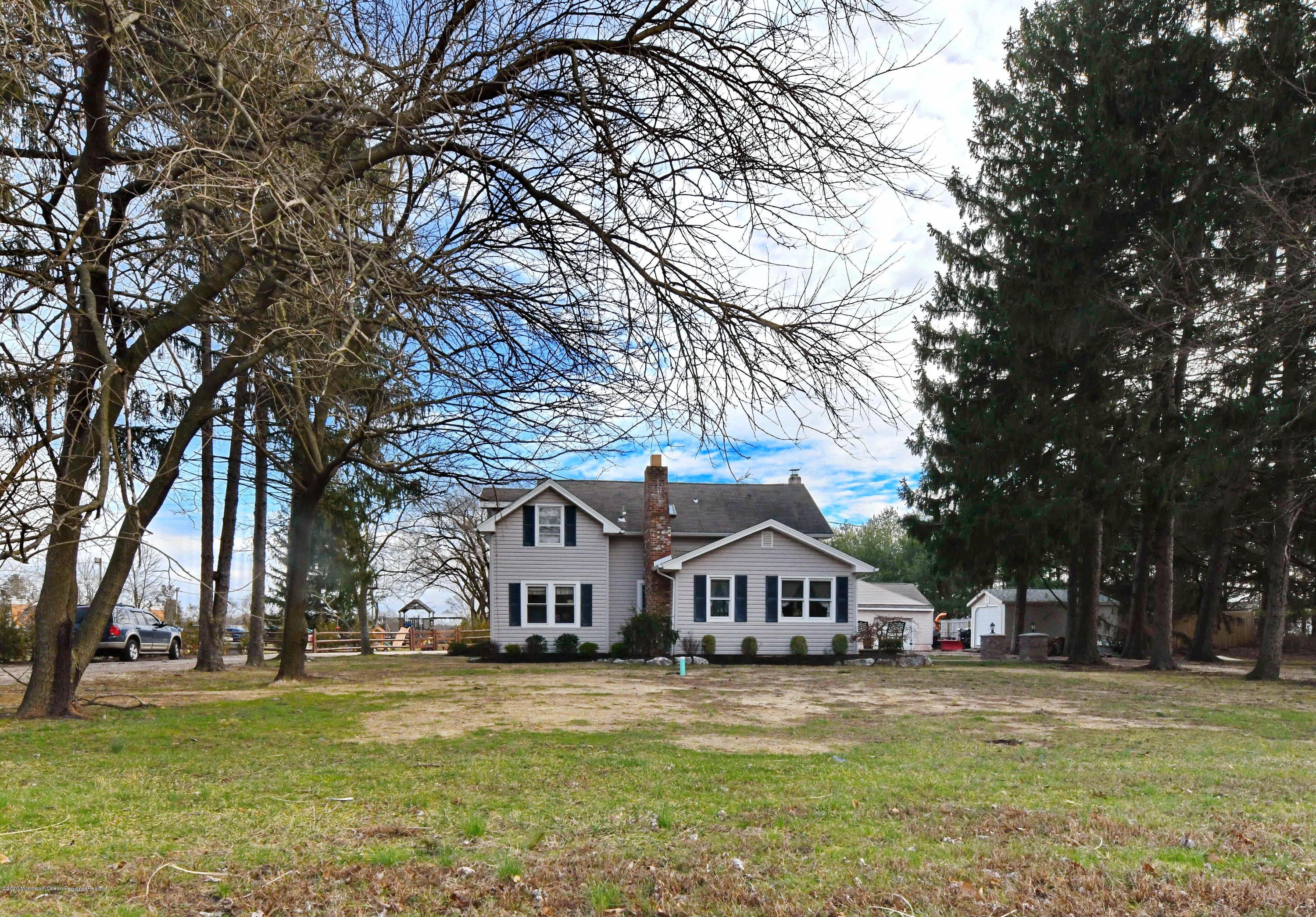 1871 Lanes Mill Road Brick, NJ 08724 - Photo 28 of 31 a front view of a house with a yard