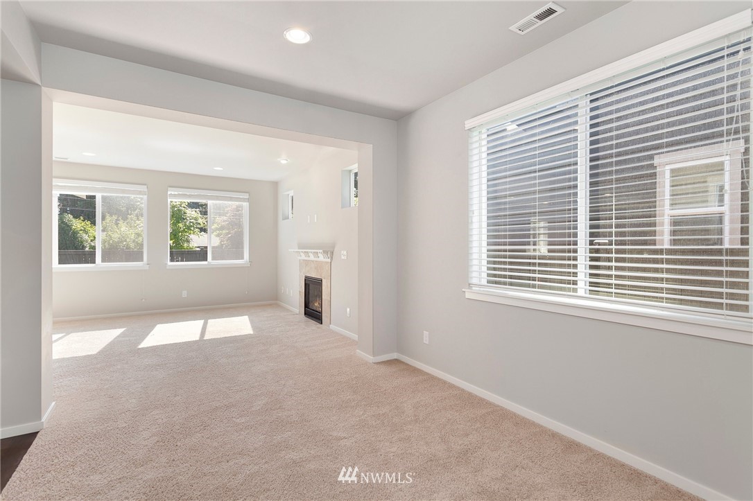 18504 115th Place Southeast Renton, WA 98055 - Photo 2 of 40 a view of an empty room with a window