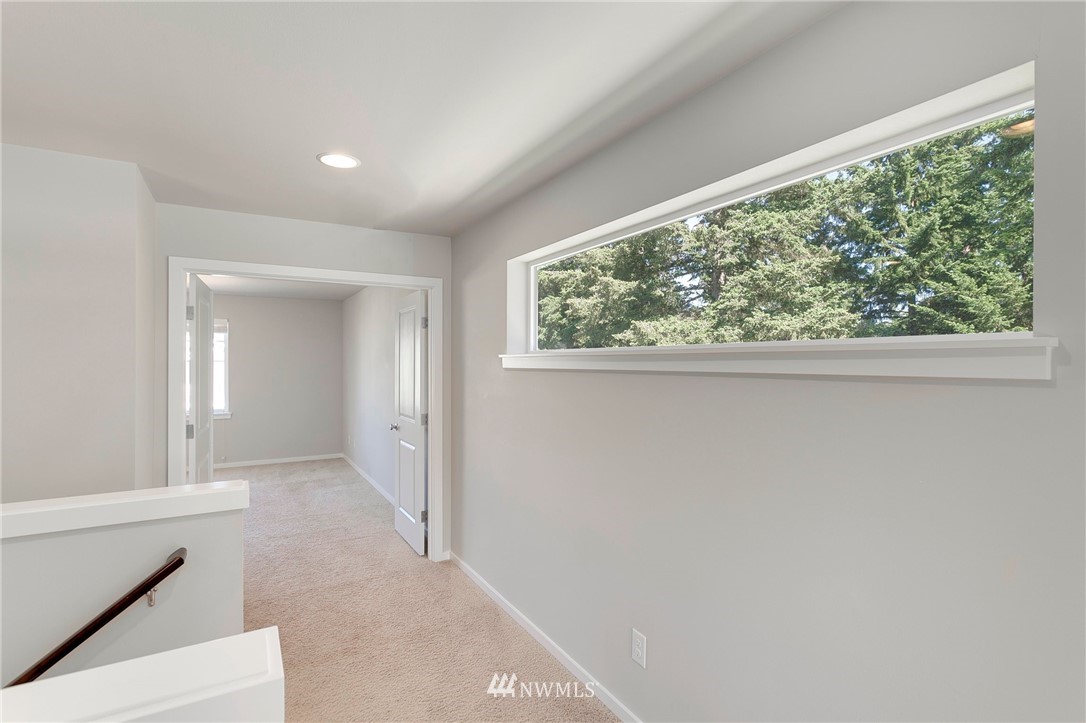 18504 115th Place Southeast Renton, WA 98055 - Photo 19 of 40 a view of a room that has a window in it