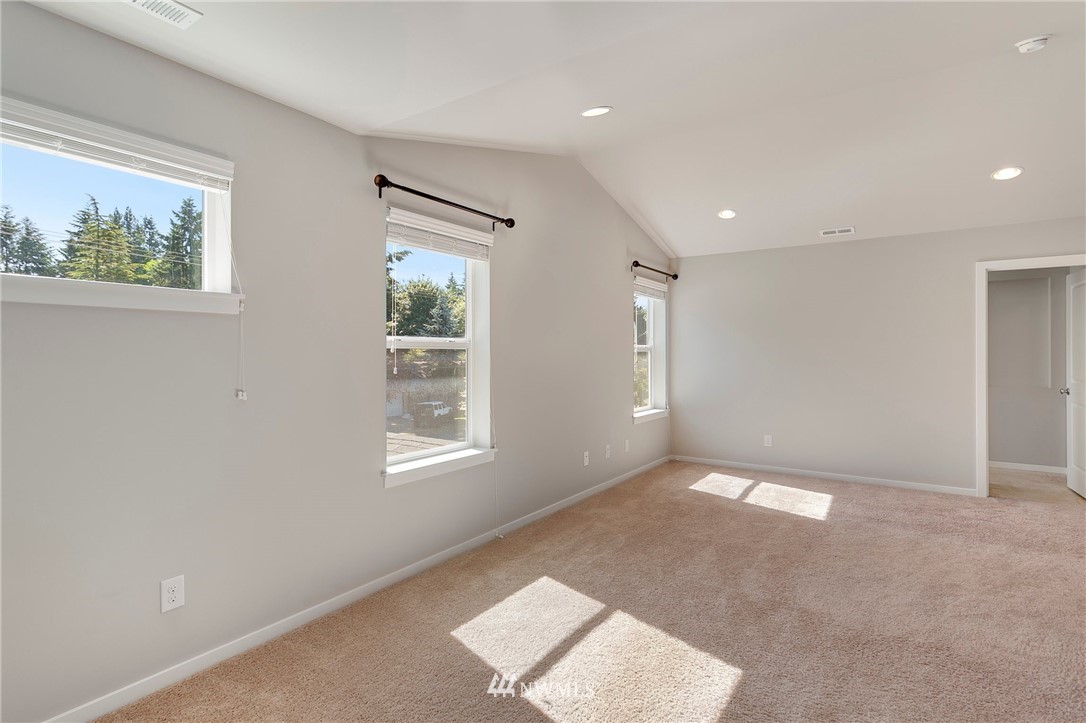 18504 115th Place Southeast Renton, WA 98055 - Photo 21 of 40 a view of an empty room with a window