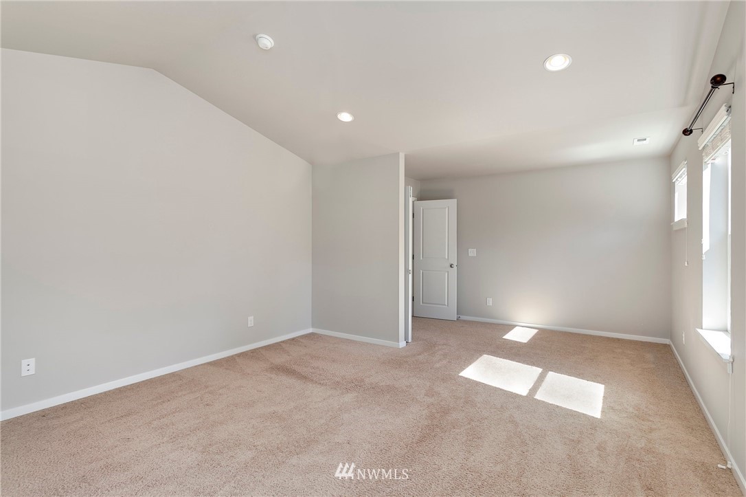 18504 115th Place Southeast Renton, WA 98055 - Photo 27 of 40 an empty room with windows and entrance
