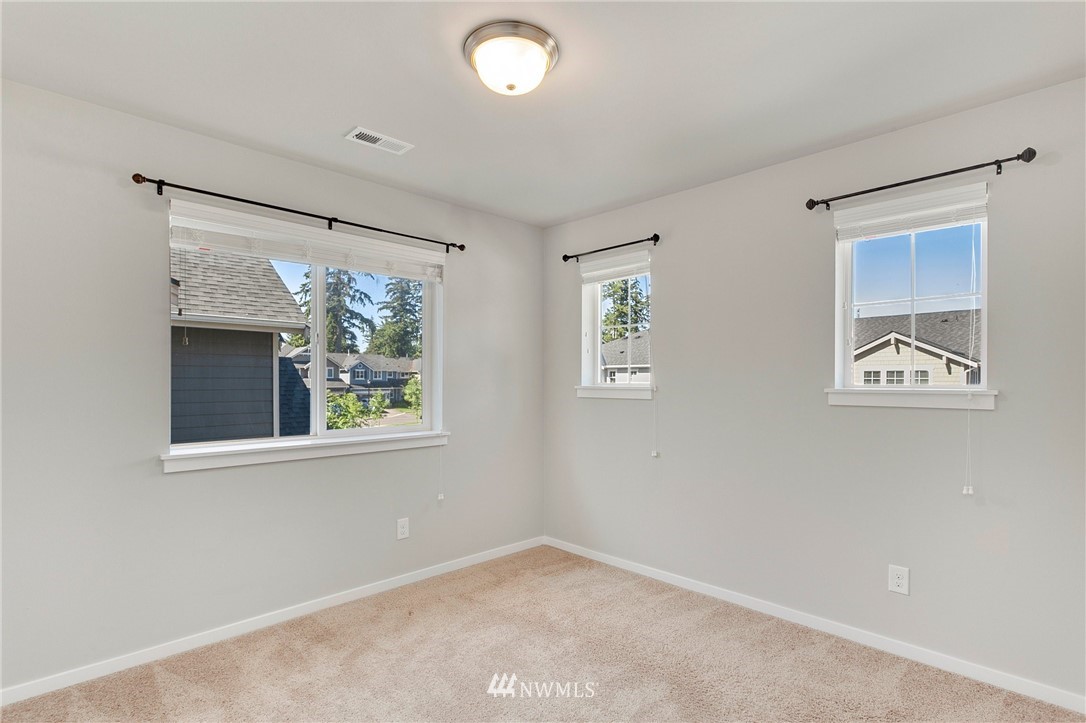 18504 115th Place Southeast Renton, WA 98055 - Photo 28 of 40 an empty room with windows and closet