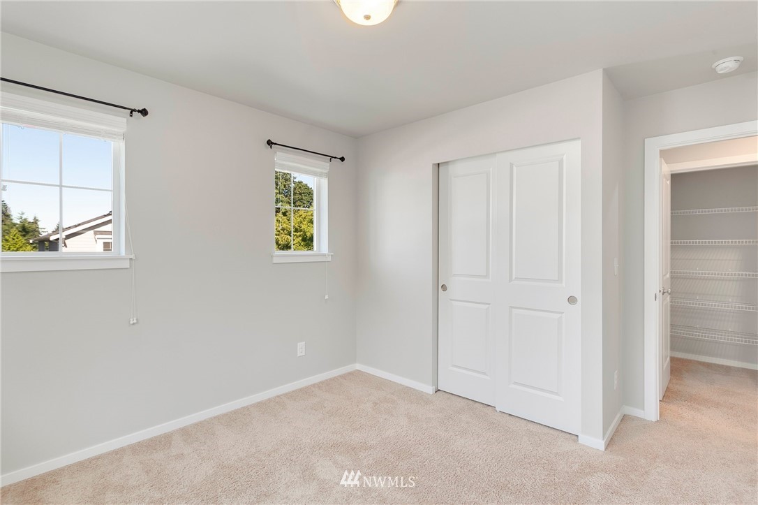 18504 115th Place Southeast Renton, WA 98055 - Photo 29 of 40 an empty room with windows and closet