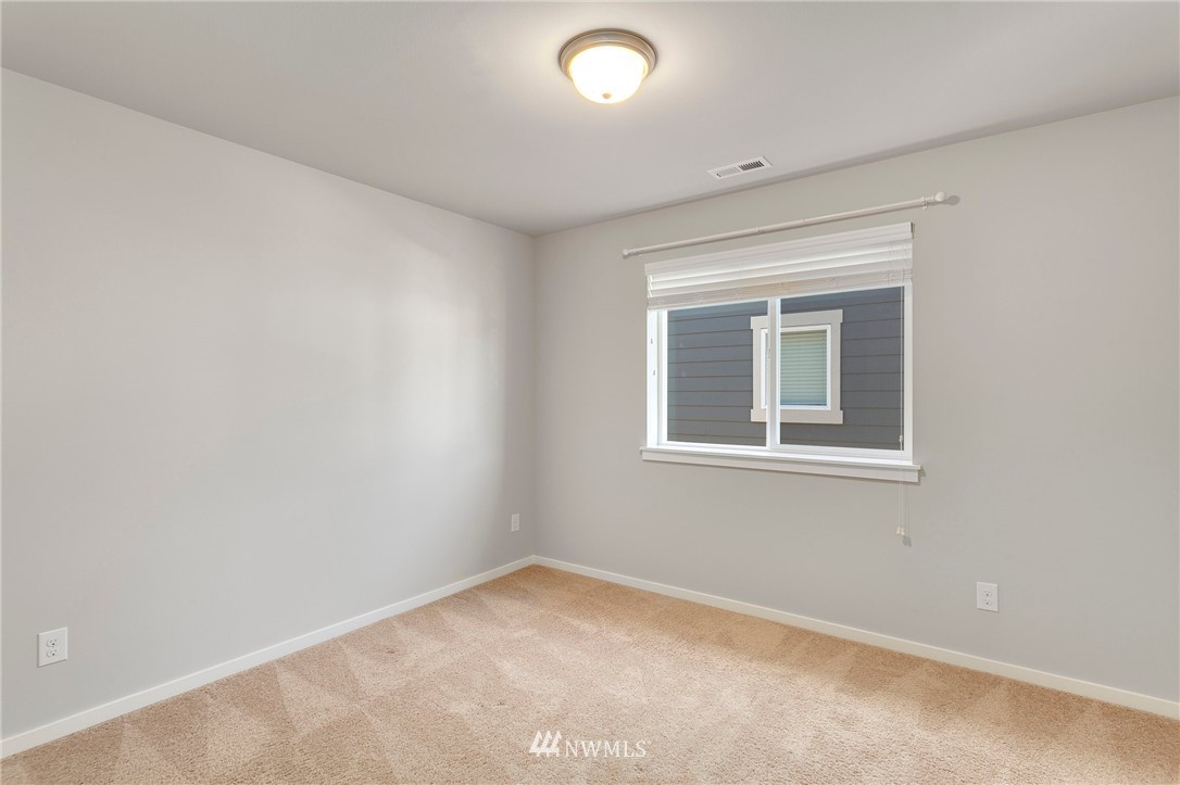 18504 115th Place Southeast Renton, WA 98055 - Photo 31 of 40 an empty room with a window