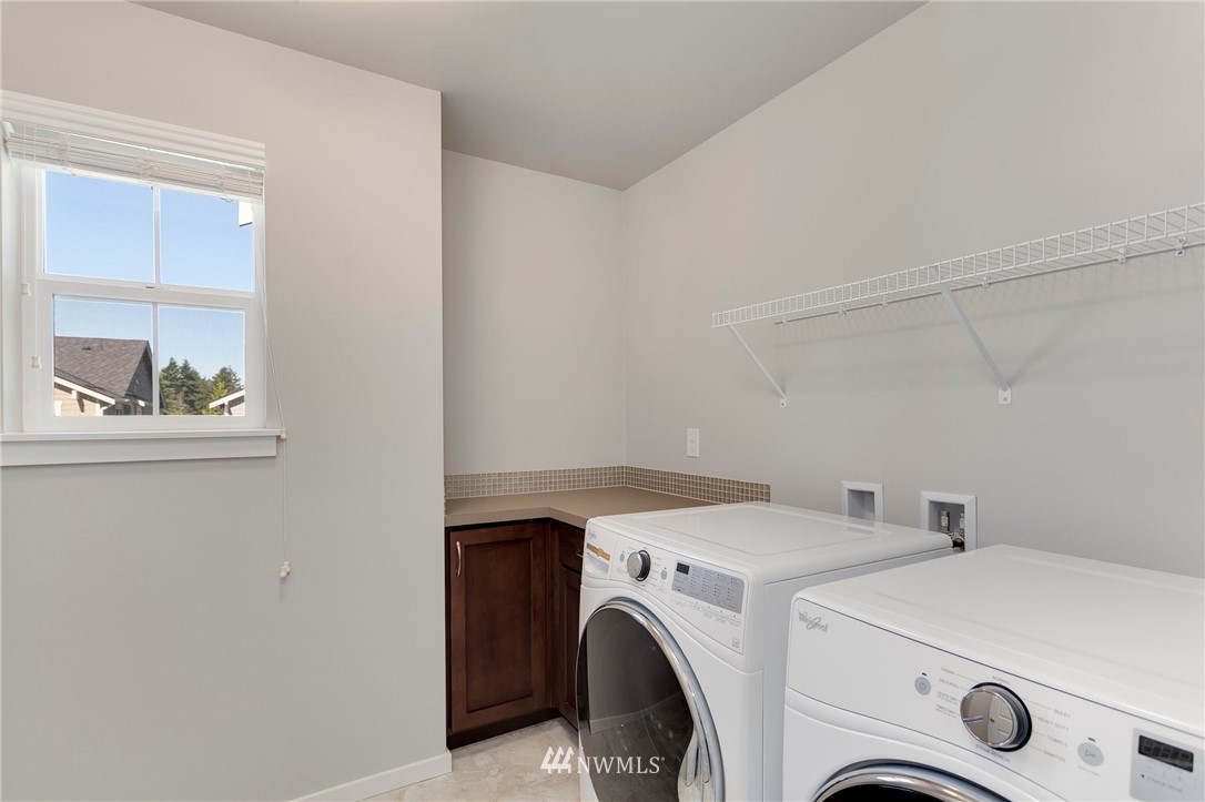 18504 115th Place Southeast Renton, WA 98055 - Photo 35 of 40 a utility room with dryer and washer