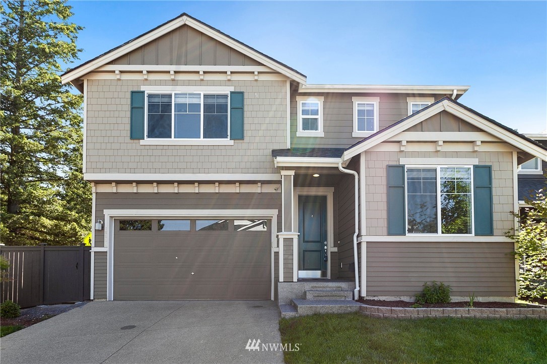 18504 115th Place Southeast Renton, WA 98055 - Photo 40 of 40 a front view of a house with a yard