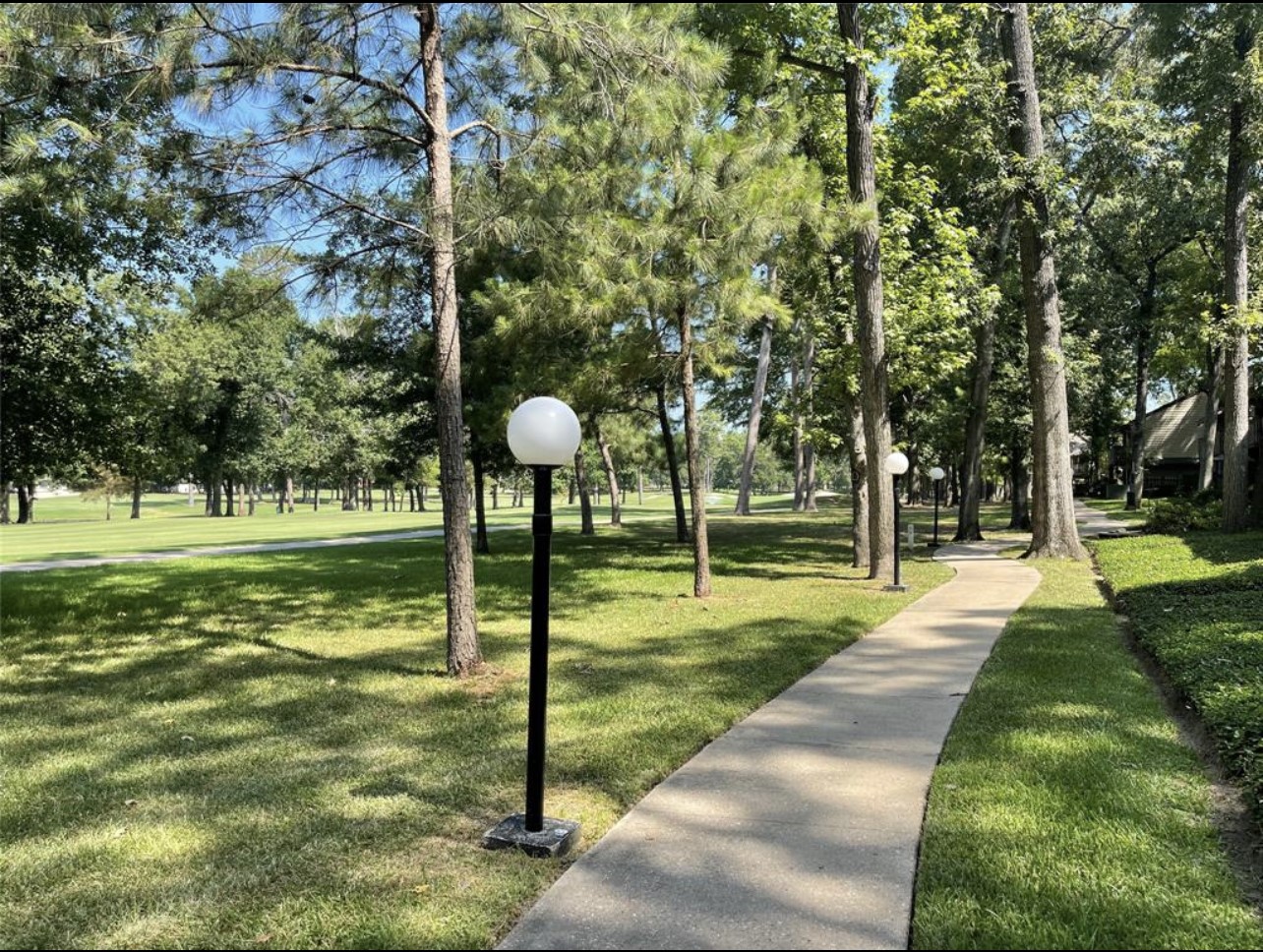 12900 Walden Road, Unit 216B Montgomery, TX 77356 - Photo 22 of 44 Sidewalks for your morning and evening walks with Beautiful views of the Golf Course