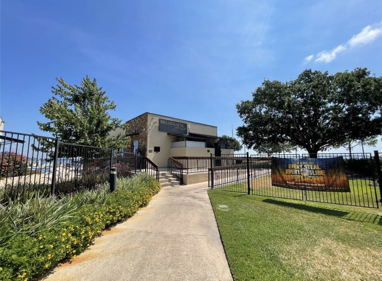 12900 Walden Road, Unit 216B Montgomery, TX 77356 - Photo 31 of 44 Welcome to Break Water Grill on the Lake!