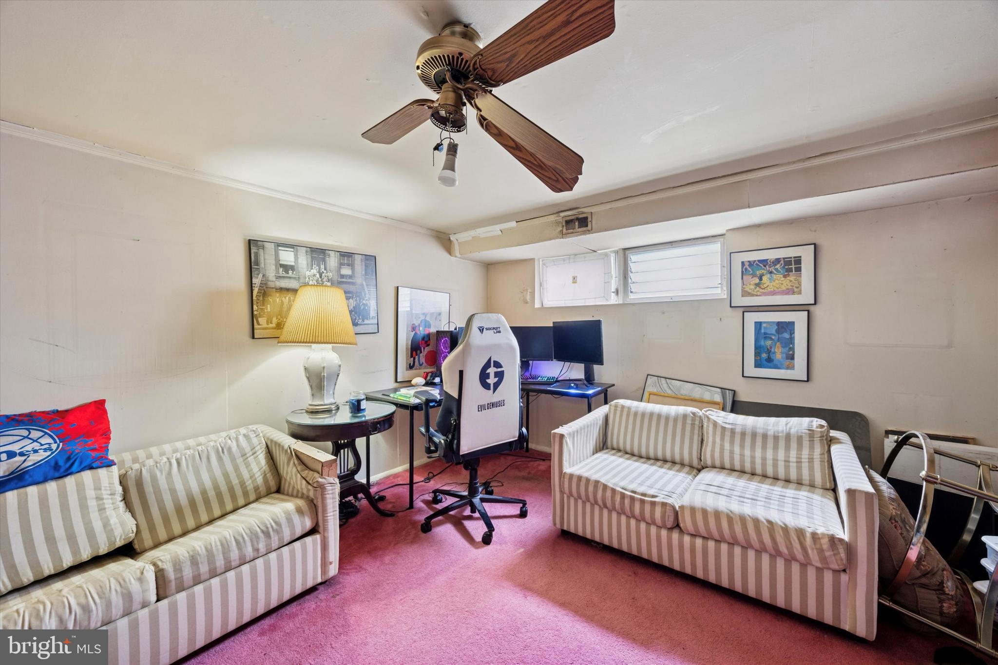 2831 Chase Road Philadelphia, PA 19152 - Photo 21 of 26 a living room with furniture and a flat screen tv