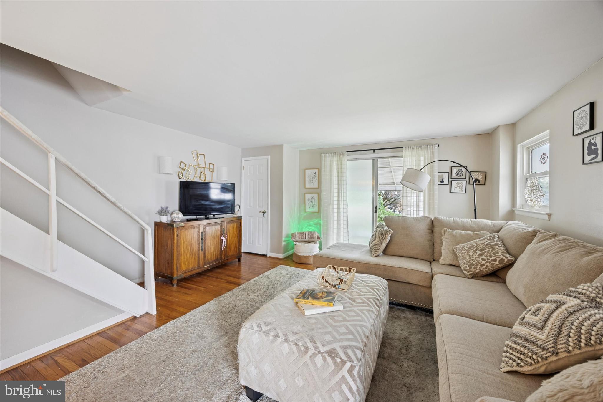 2831 Chase Road Philadelphia, PA 19152 - Photo 3 of 26 a living room with furniture and a flat screen tv