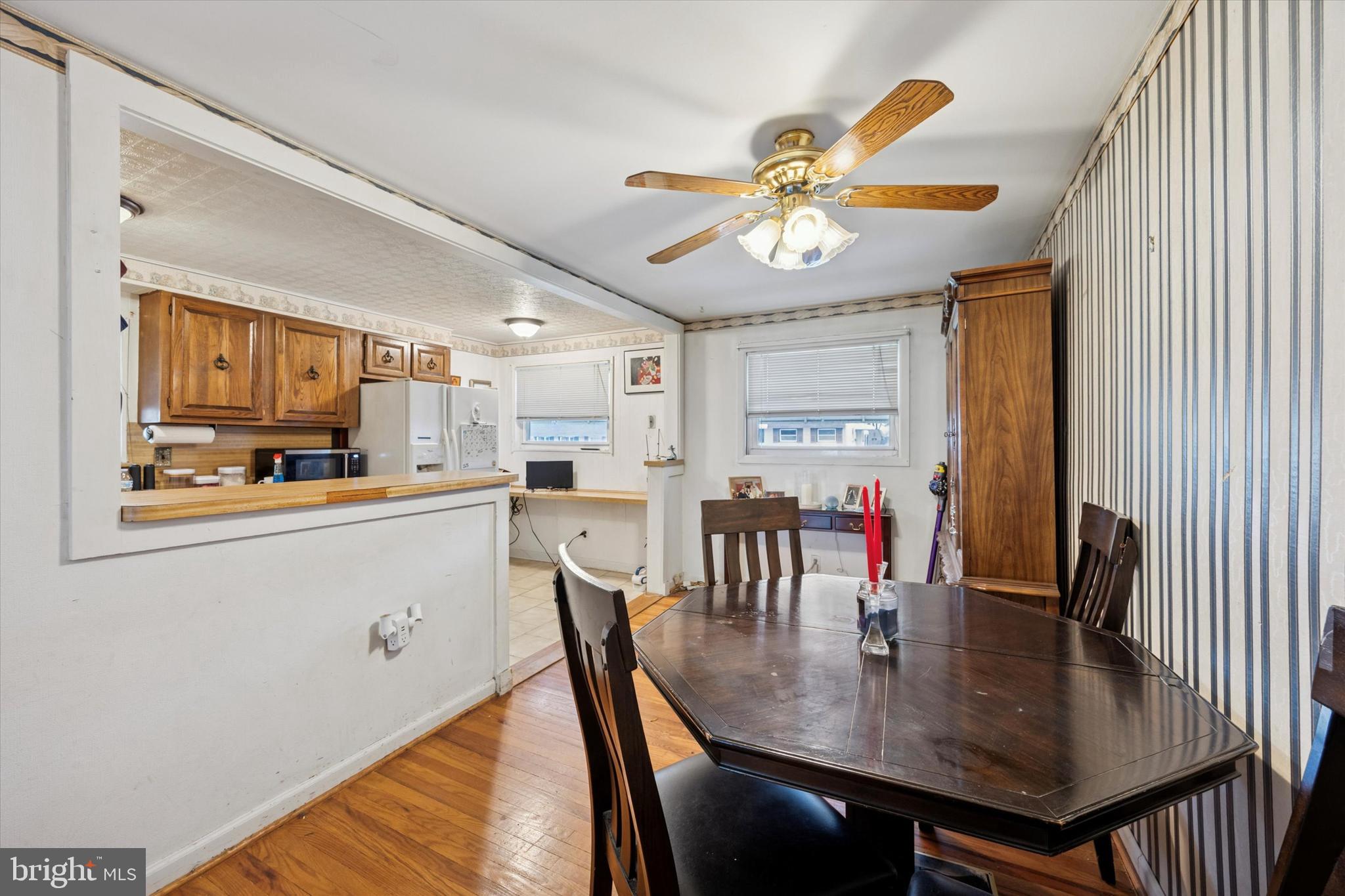 2831 Chase Road Philadelphia, PA 19152 - Photo 7 of 26 a view of a dining room with furniture and wooden floor