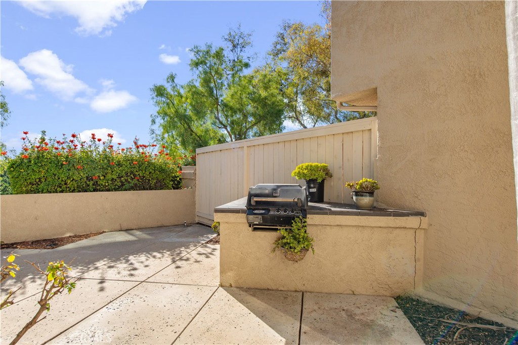 335 Stanford Court Irvine, CA 92612 - Photo 28 of 31 a view of backyard with sitting area