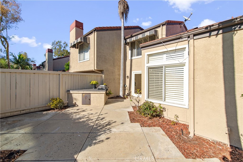 335 Stanford Court Irvine, CA 92612 - Photo 30 of 31 a view of a house with patio