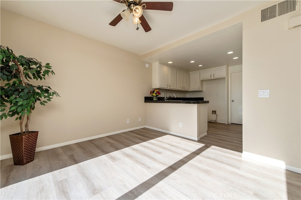 335 Stanford Court Irvine, CA 92612 - Photo 10 of 31 a view of a kitchen with a sink and cabinets