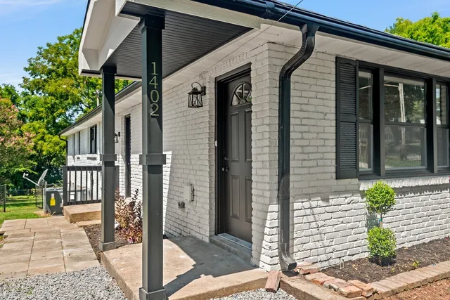 a front view of a house with a porch