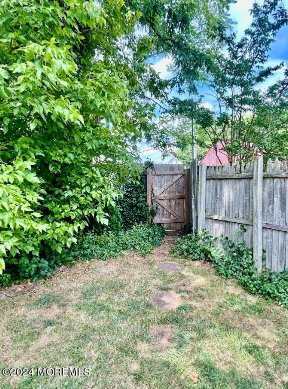 136 Broad Street Matawan, NJ 07747 - Photo 29 of 29 Gate to Parking Lot