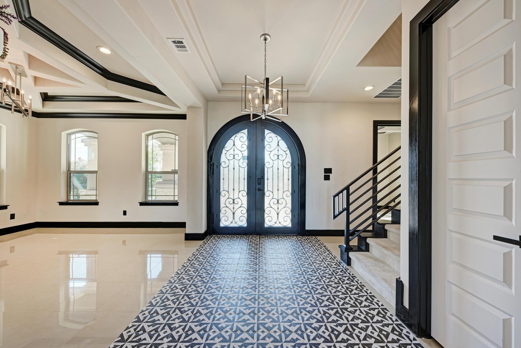 104 Spring Valley Street Hutto, TX 78634 - Photo 8 of 40 Foyer featuring french doors, a chandelier, stairs, recessed lighting, and ornamental molding