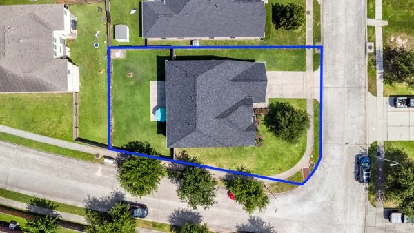 a room with a bed a table and a fireplace