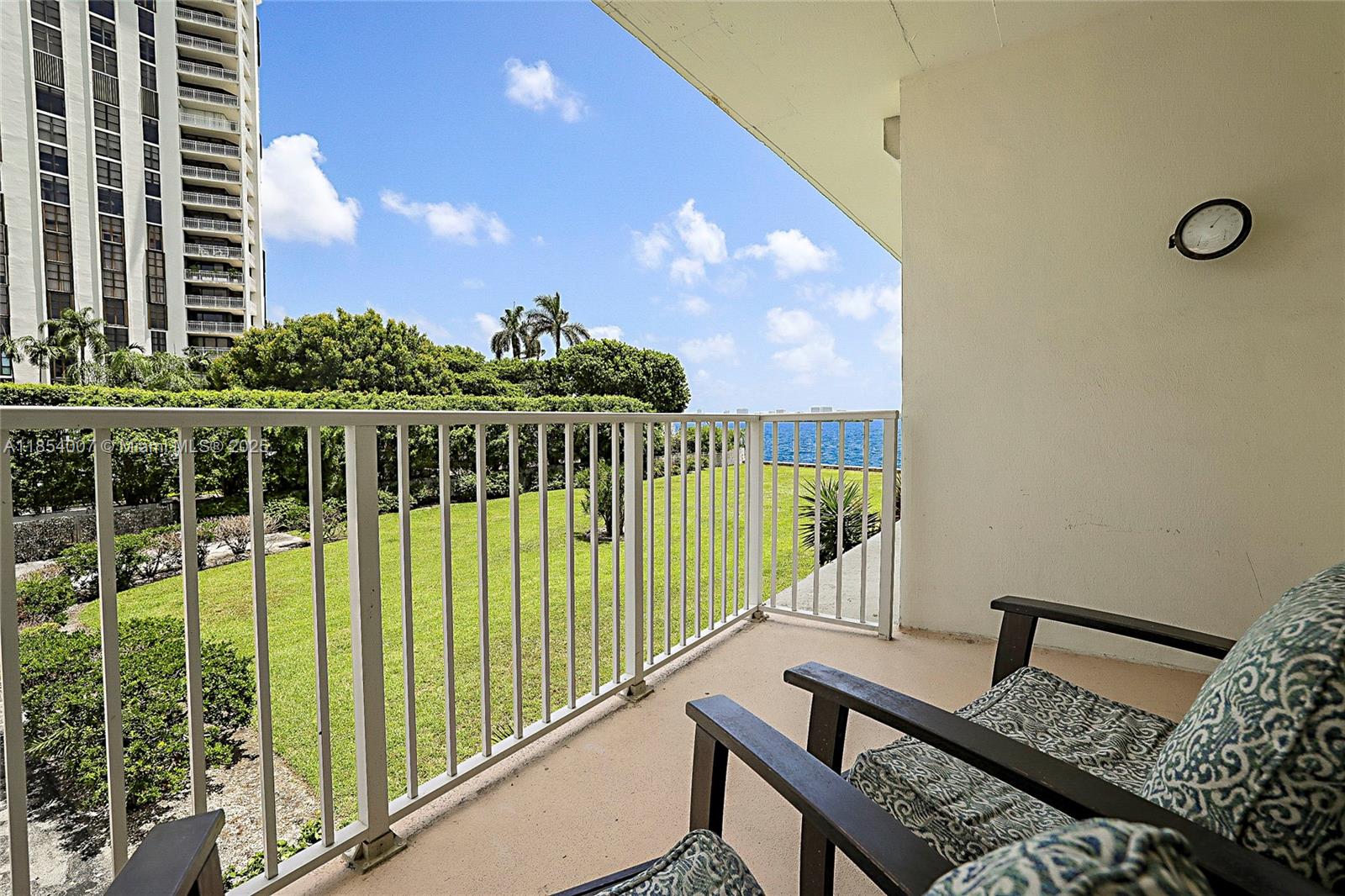 1700 Northeast 105th Street, Unit 203 Miami Shores, FL 33138 - Photo 27 of 45 a view of balcony with furniture