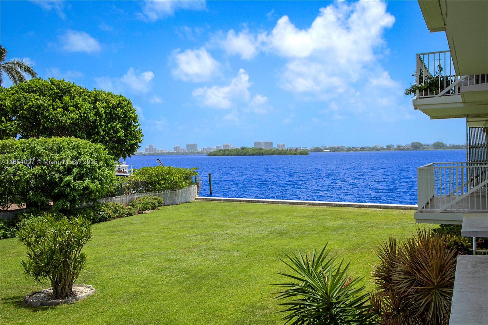1700 Northeast 105th Street, Unit 203 Miami Shores, FL 33138 - Photo 31 of 45 a view of yard with ocean view