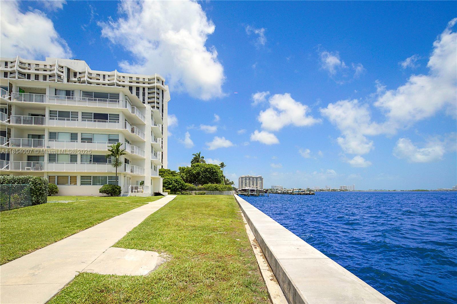 1700 Northeast 105th Street, Unit 203 Miami Shores, FL 33138 - Photo 39 of 45 a view of an apartment with a yard