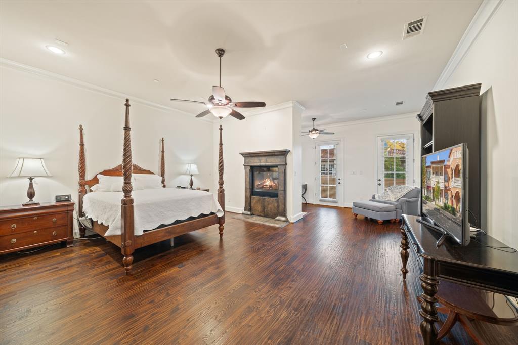 34 Piazza Lane Colleyville, TX 76034 - Photo 16 of 38 a bedroom with a bed and a flat screen tv