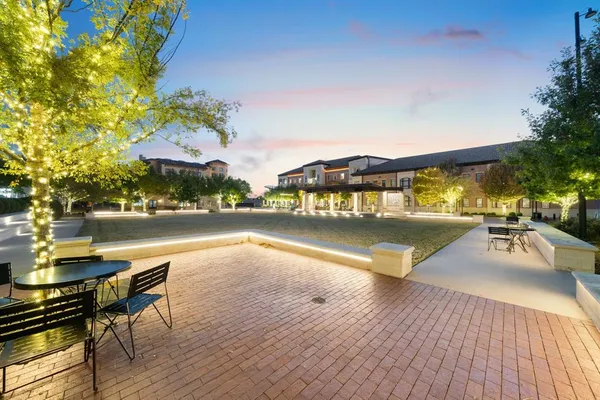 a view of a lake with couches