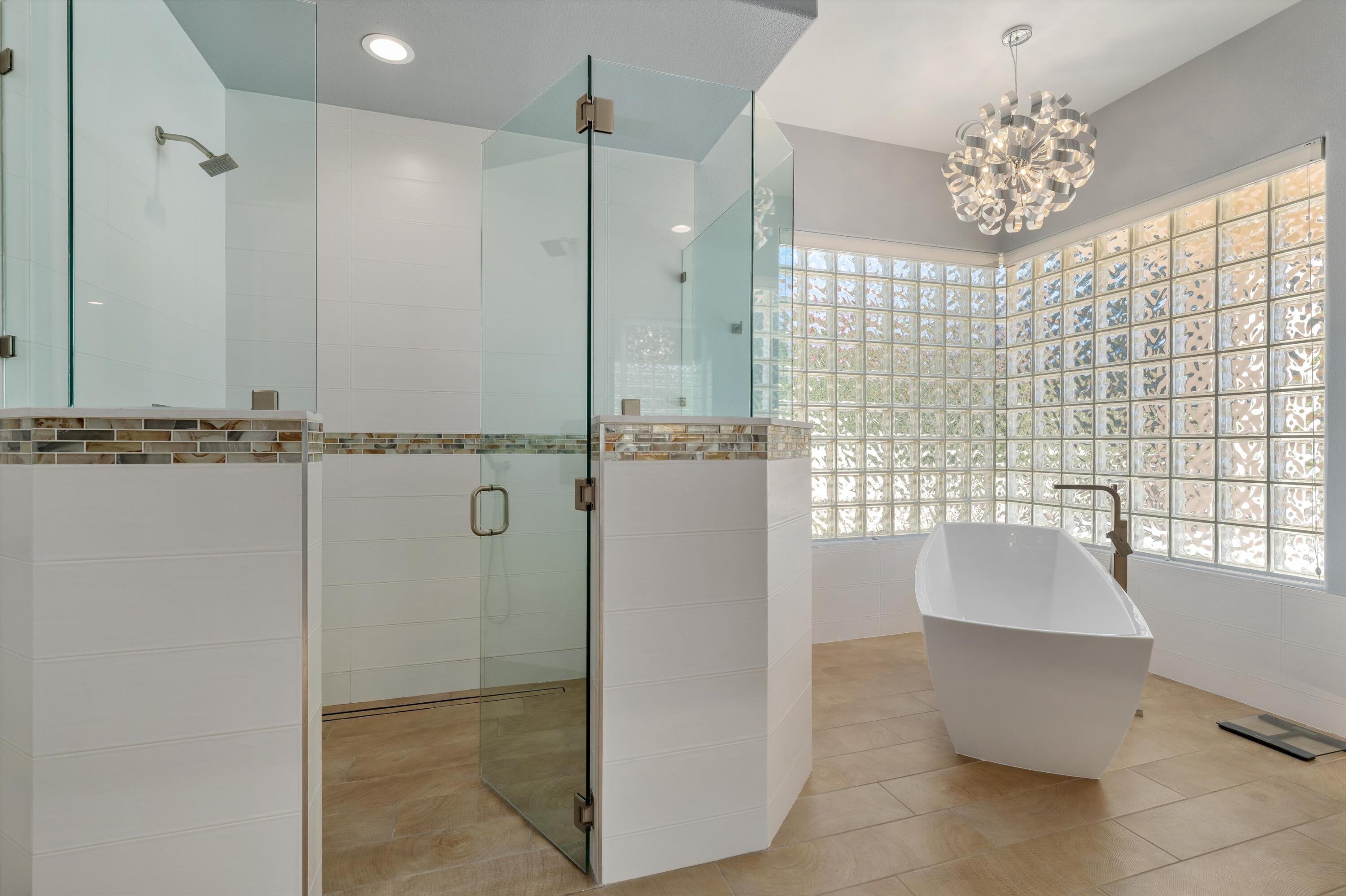270 Loch Lomond Road Rancho Mirage, CA 92270 - Photo 26 of 51 a bathroom with a sink and a mirror