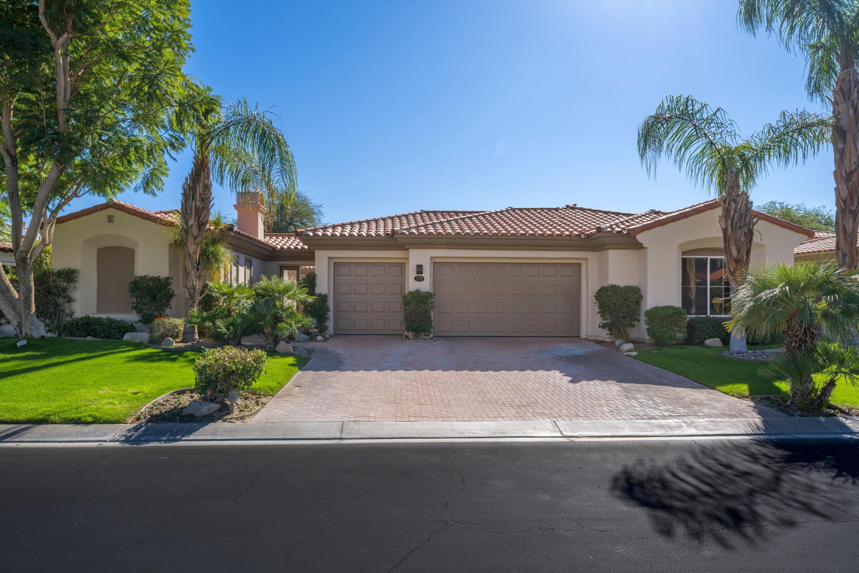 270 Loch Lomond Road Rancho Mirage, CA 92270 - Photo 3 of 51 a front view of house with yard and green space