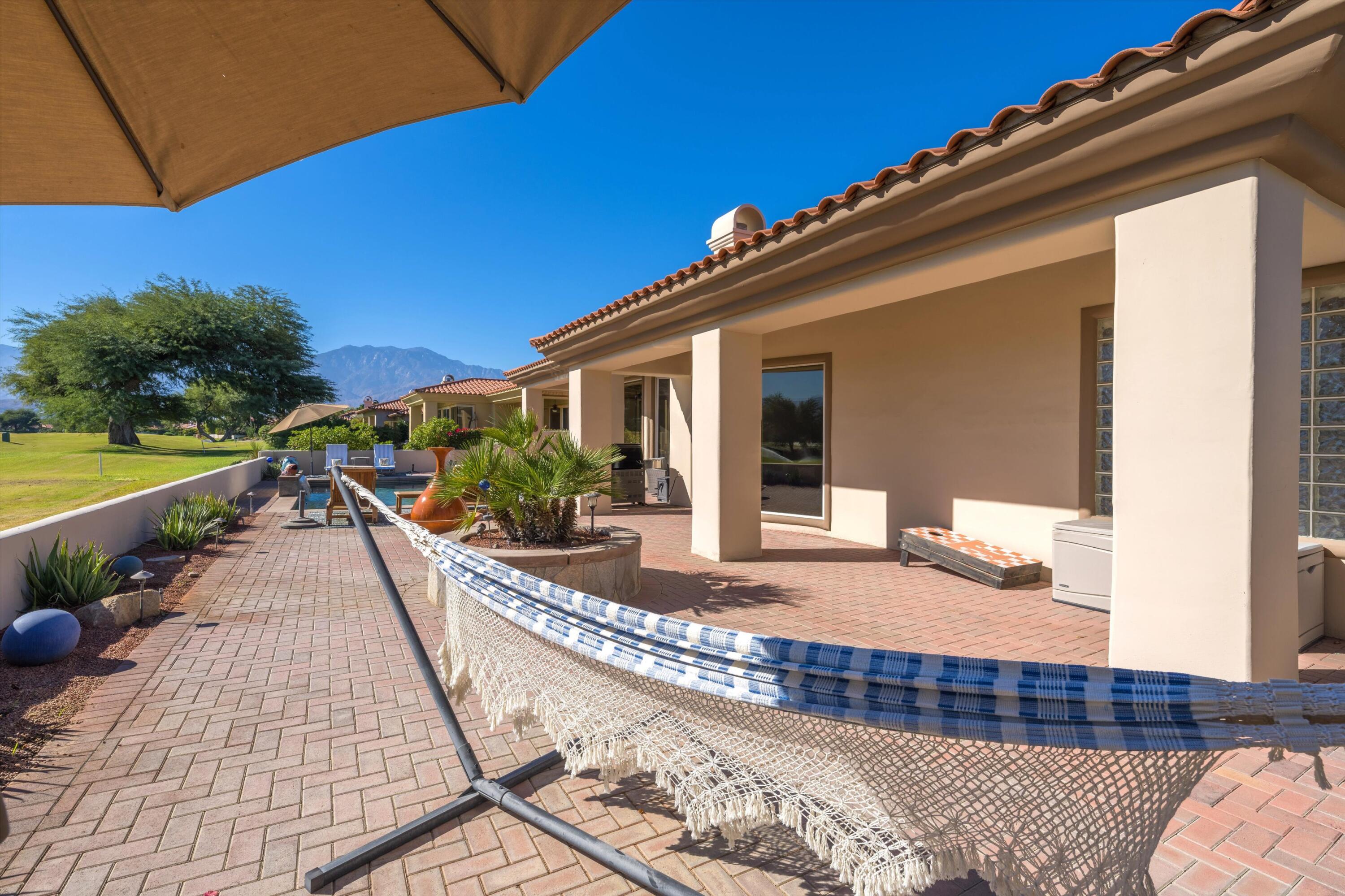 270 Loch Lomond Road Rancho Mirage, CA 92270 - Photo 39 of 51 a view of a house with a patio