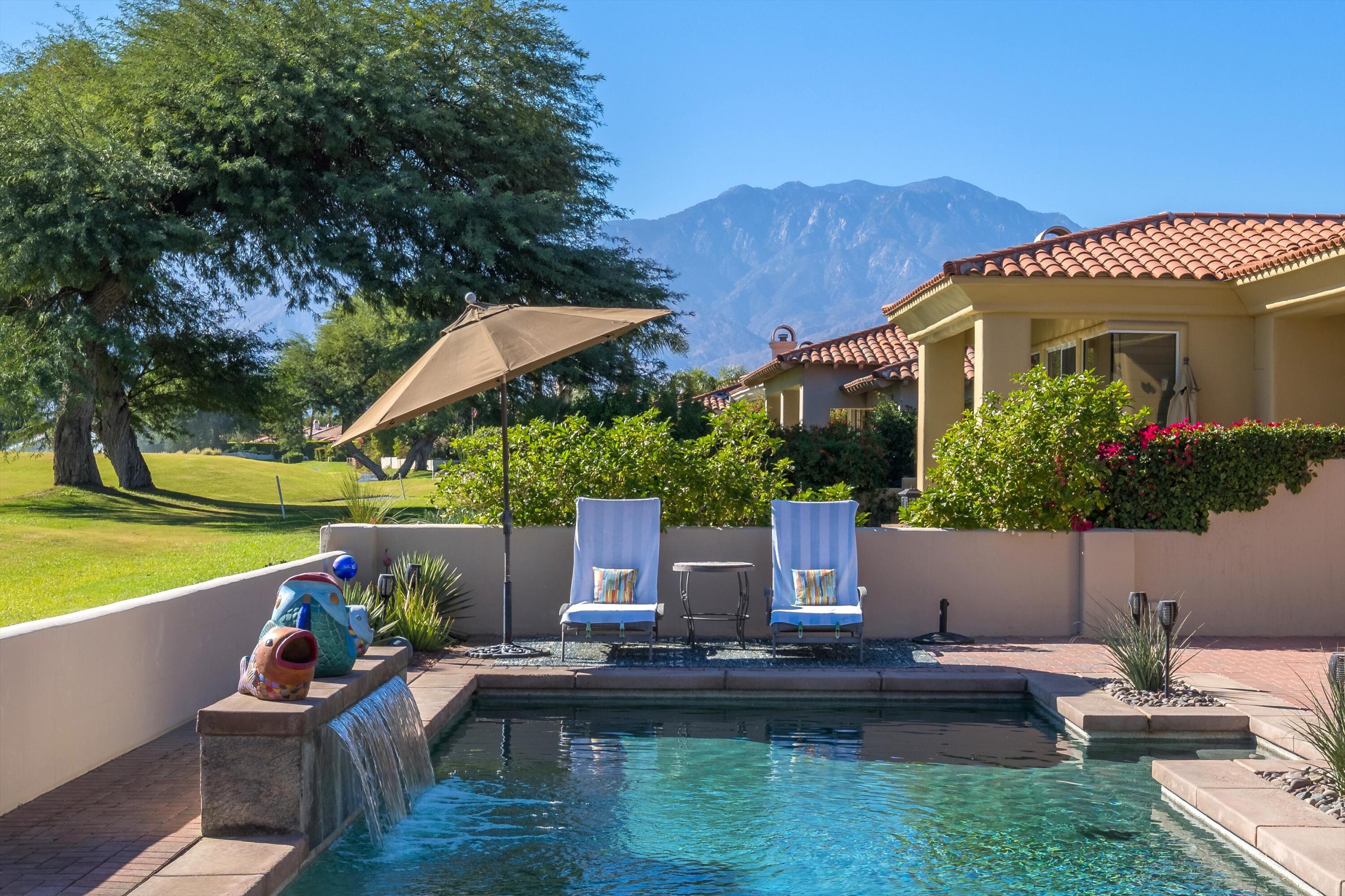 270 Loch Lomond Road Rancho Mirage, CA 92270 - Photo 42 of 51 a view of house with garden space and sitting area