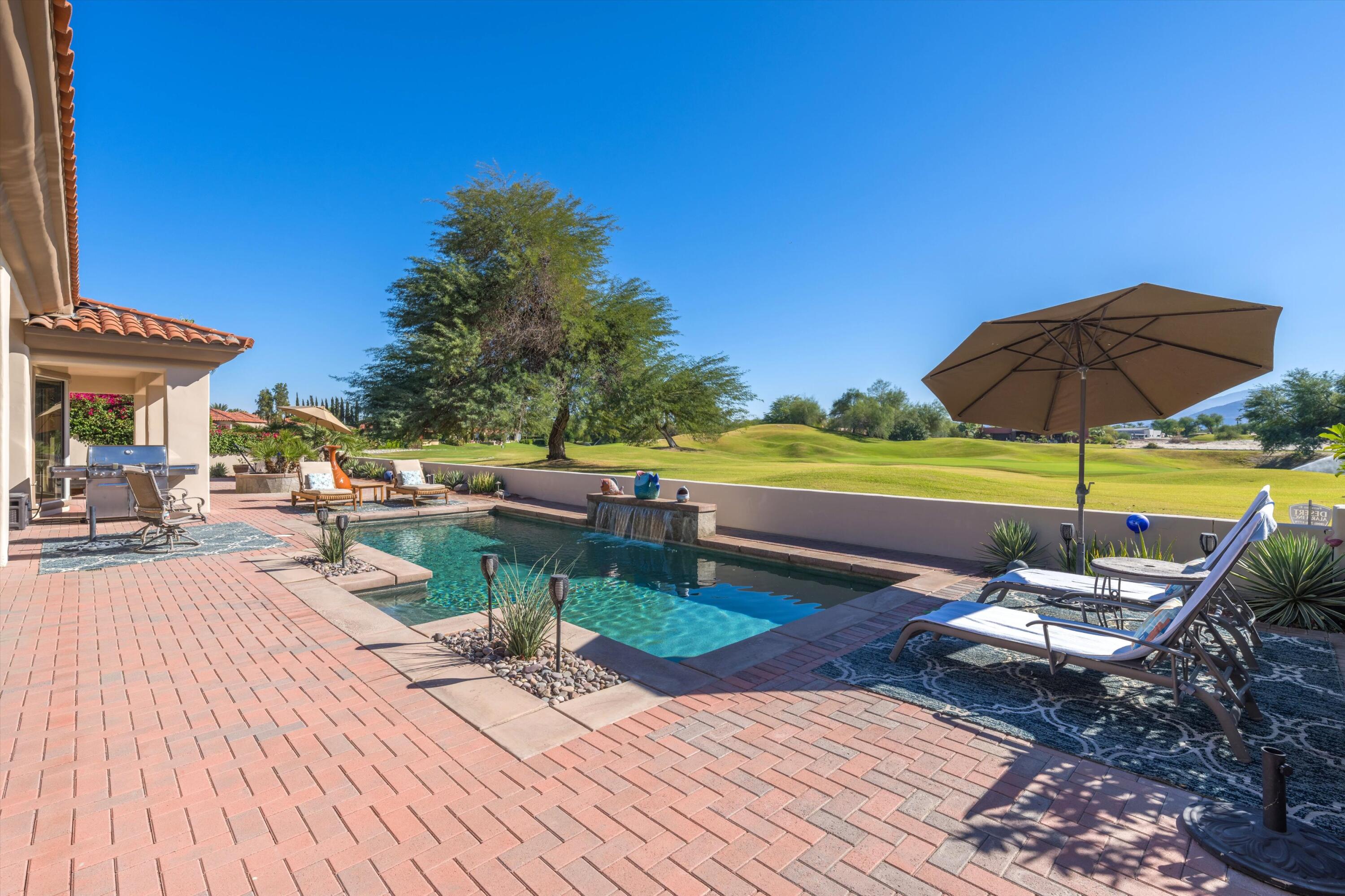 270 Loch Lomond Road Rancho Mirage, CA 92270 - Photo 44 of 51 a view of swimming pool with lounge chair
