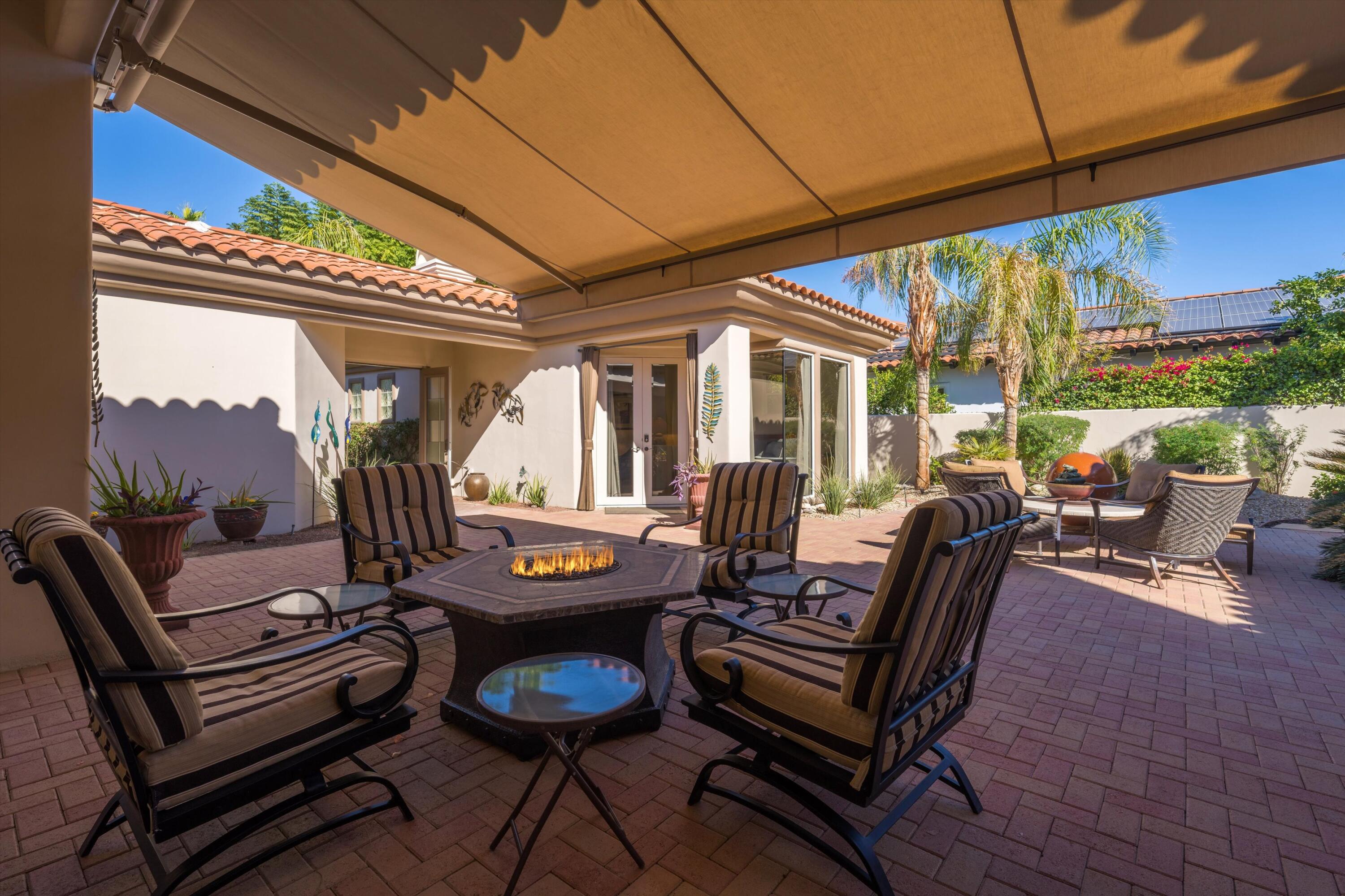 270 Loch Lomond Road Rancho Mirage, CA 92270 - Photo 7 of 51 a outdoor living space with furniture