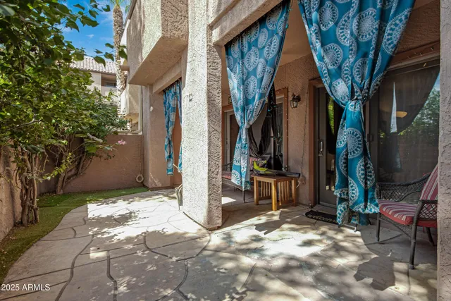 a view of a house with a tree