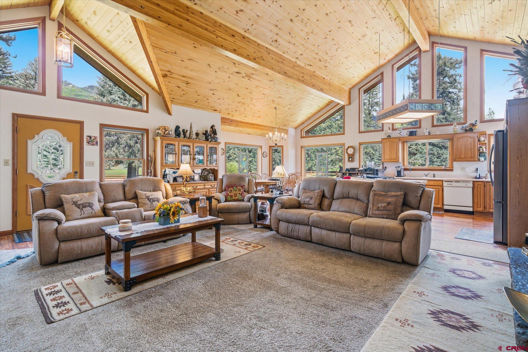 197 Hummingbird Way Bayfield, CO 81122 - Photo 10 of 44 a living room with furniture and a large window