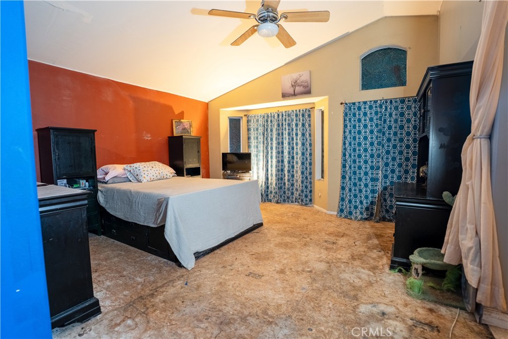 21329 Tennyson Road Moreno Valley, CA 92557 - Photo 25 of 32 a bedroom with a bed and window