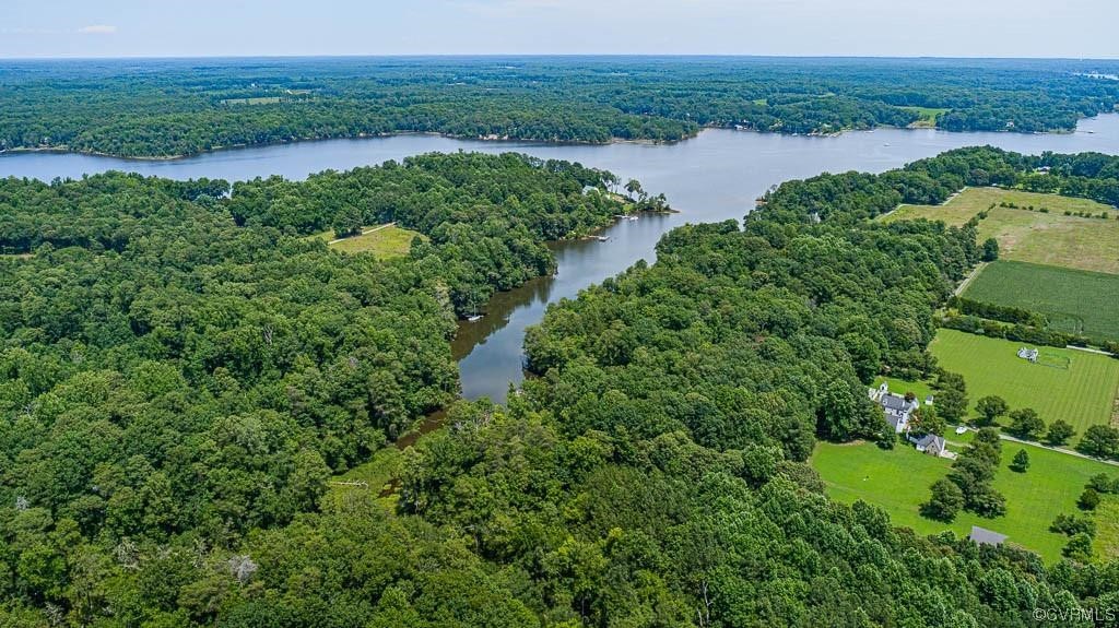 0 Ottoman Ferry Road Lancaster, VA 22503 - Photo 14 of 23 a view of a lake with a yard