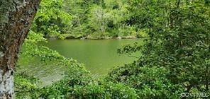 0 Ottoman Ferry Road Lancaster, VA 22503 - Photo 23 of 23 a view of a lake with a yard