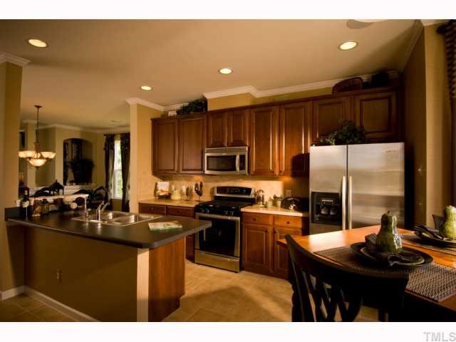 3026 Berkeley Street Raleigh, NC 27612 - Photo 2 of 5 Model home. Kitchen with work island