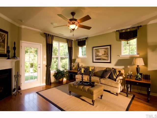 3026 Berkeley Street Raleigh, NC 27612 - Photo 4 of 5 Model home. Living room with gas fireplace.