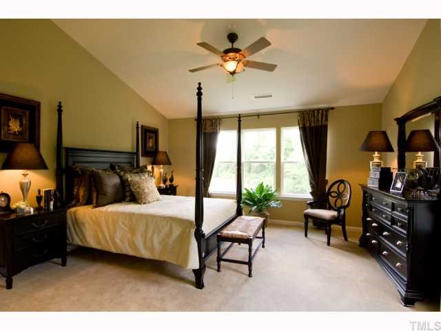 3026 Berkeley Street Raleigh, NC 27612 - Photo 5 of 5 Model home. Master bedroom with vaulted ceilings and walk in closet.