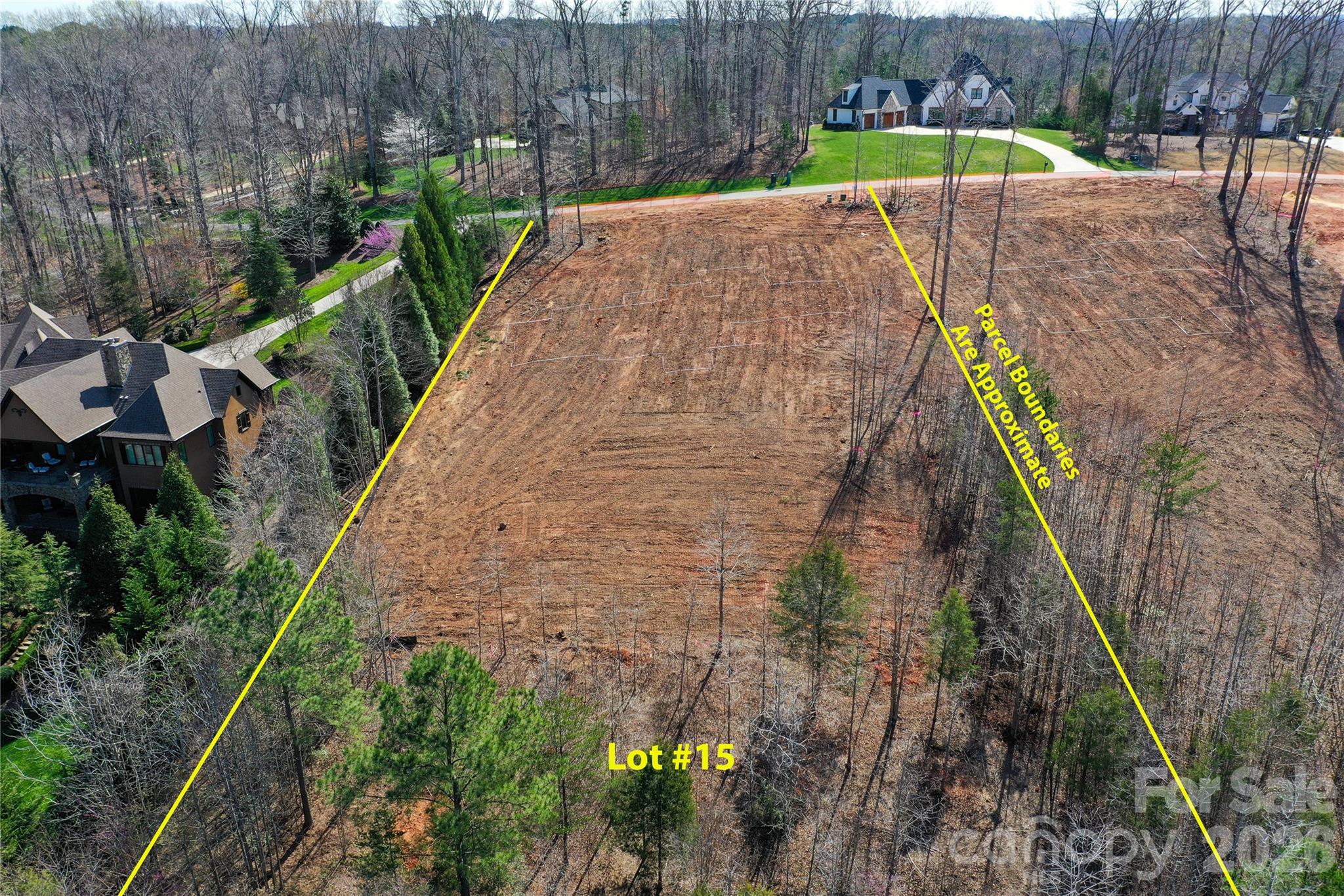7061 Ridgeview Lane, Unit 15 Iron Station, NC 28080 - Photo 14 of 19 a view of an outdoor space with a swimming pool